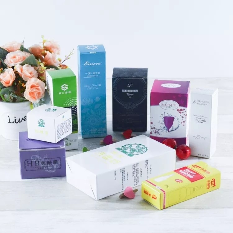 Cajas impresas a todo color de tablero de marfil Cajas de cartón blancas para cosméticos para el cuidado de la piel