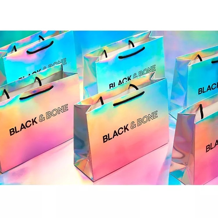 Brilla el color olográfico de Cmyk de las bolsas de la ropa de la hoja de plata
