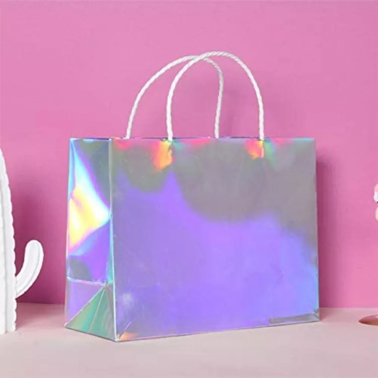 Brilla el color olográfico de Cmyk de las bolsas de la ropa de la hoja de plata